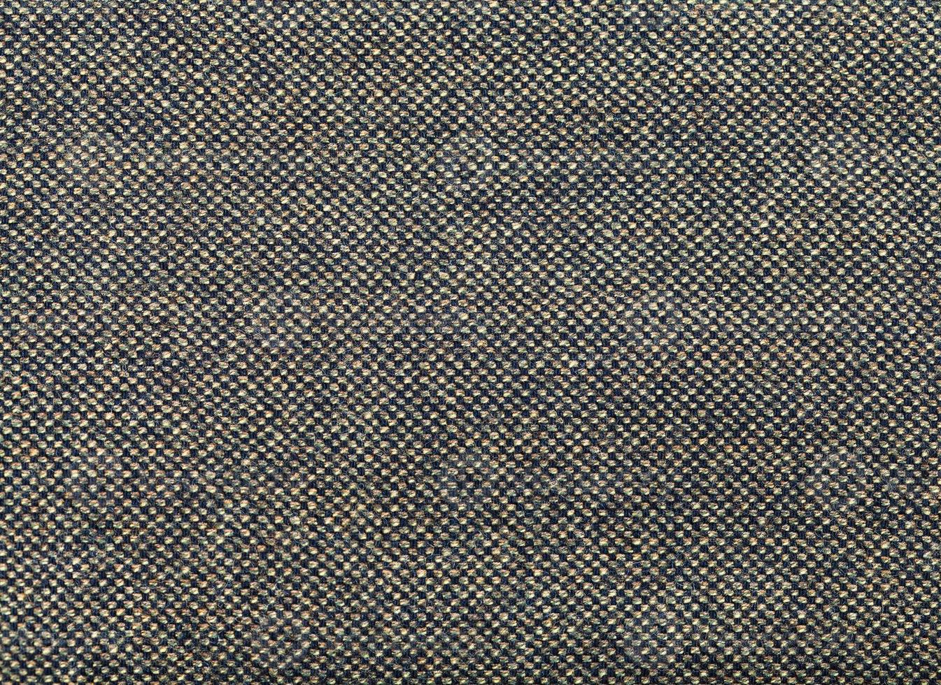 background from green and brown tweed fabric photo