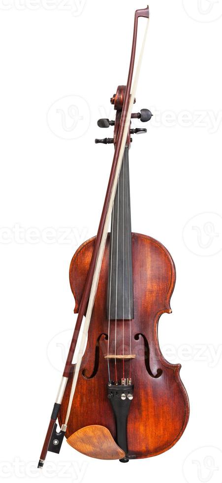 front view of violin with wooden chinrest and bow photo