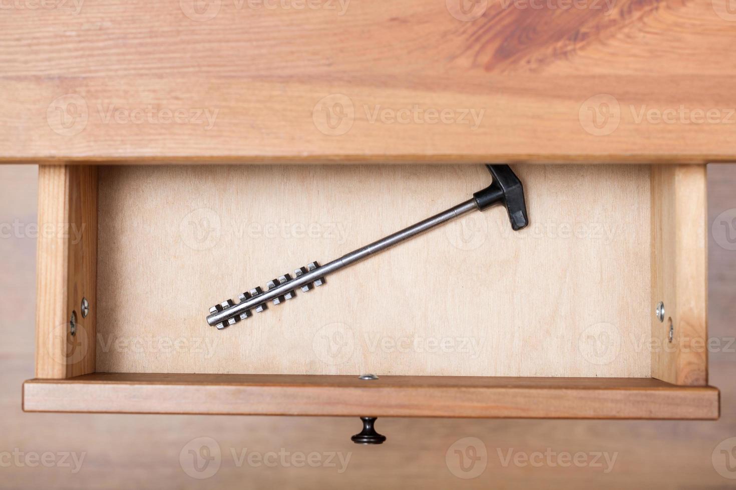 one latchkey in open drawer photo