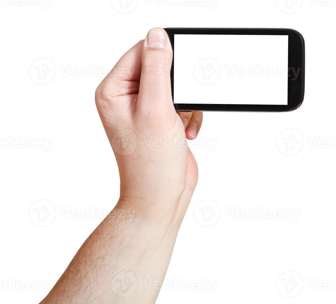male hand holding smartphone with cut out screen photo