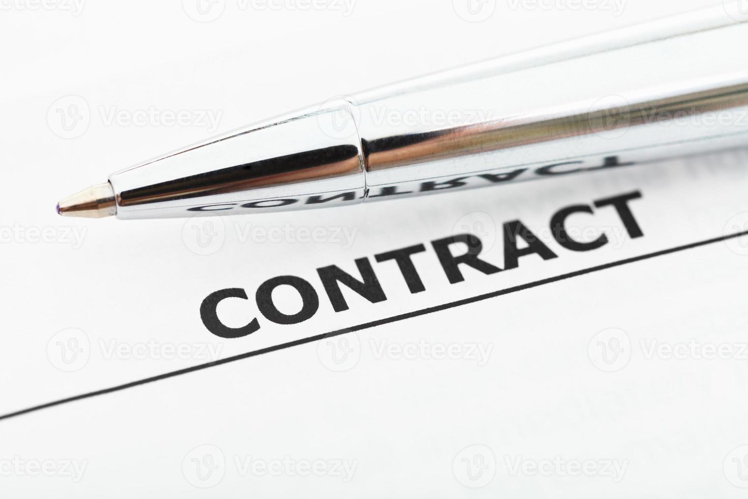 agreement and silver pen close up photo