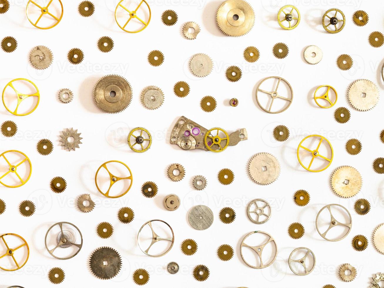 pattern from various used watch spare parts photo