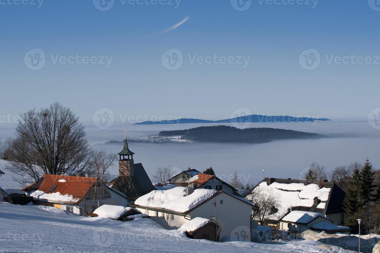 A Bavarian village view in winter snow time photo