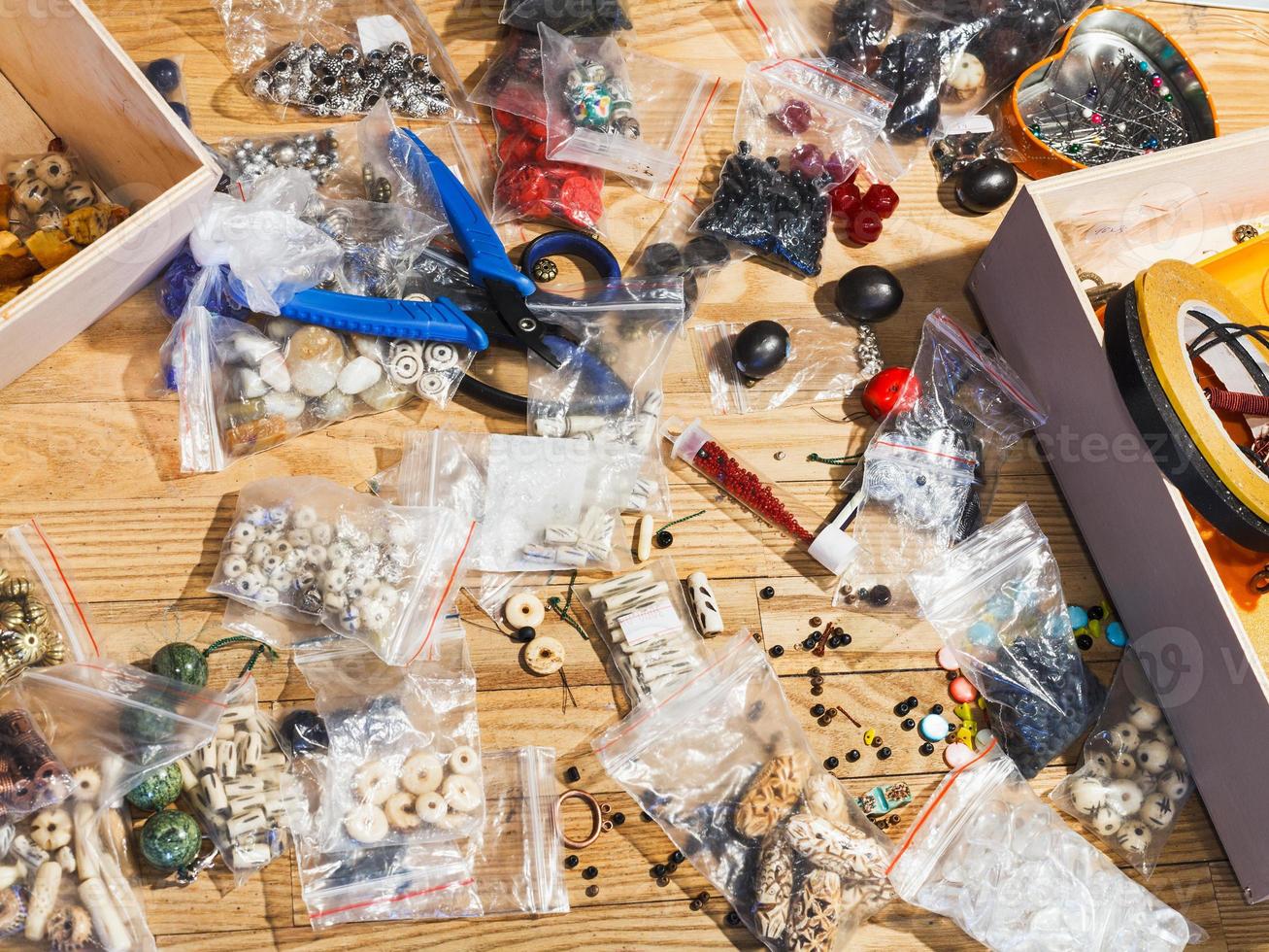 equipment for beads making on table photo