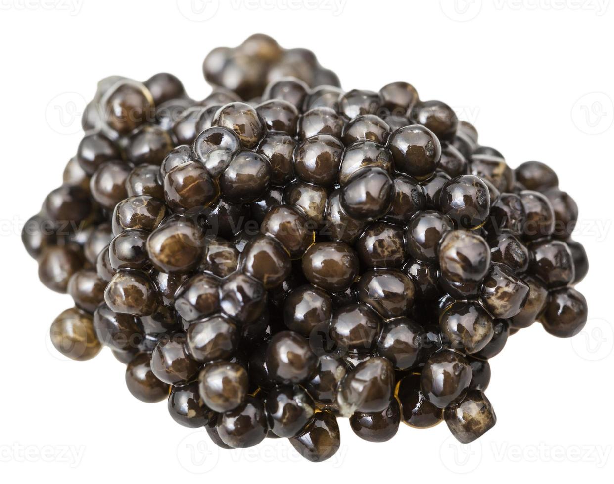 above view handful of black sturgeon caviar photo