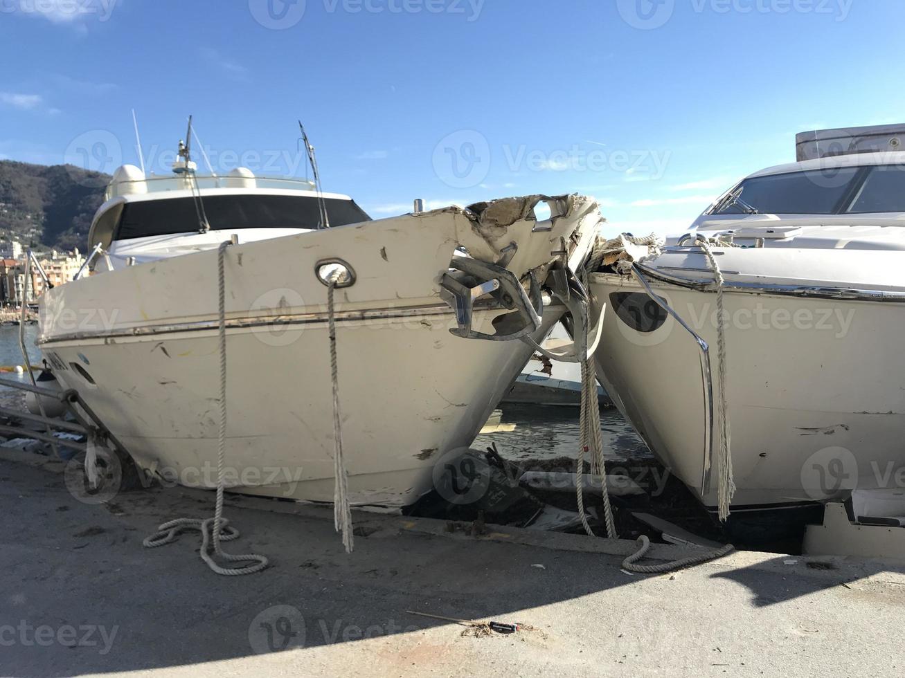 Boats destroyed by storm hurrican in Rapallo, Italy photo