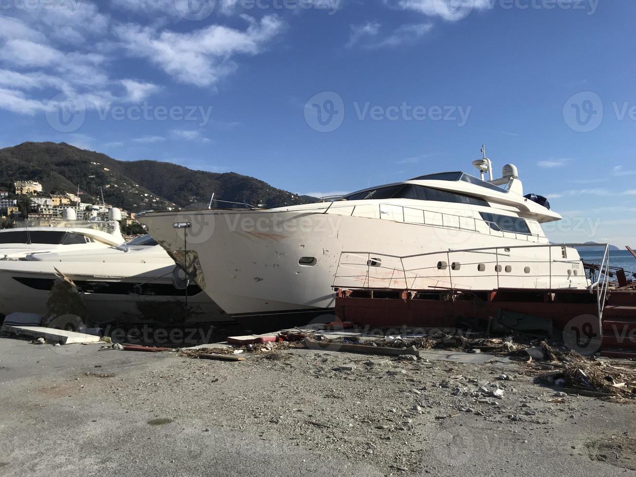 Boats destroyed by storm hurrican in Rapallo, Italy photo