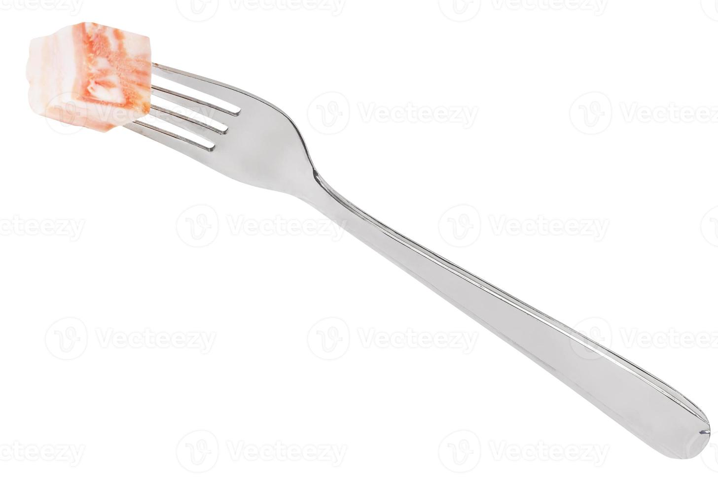 dinning fork with piece of lard isolated photo