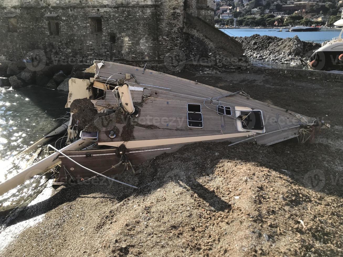 Boats destroyed by storm hurrican in Rapallo, Italy photo