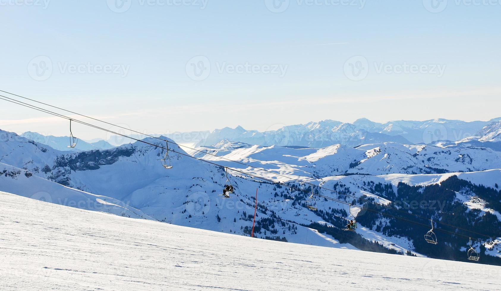 skiing tracks and ski lift in Alps photo