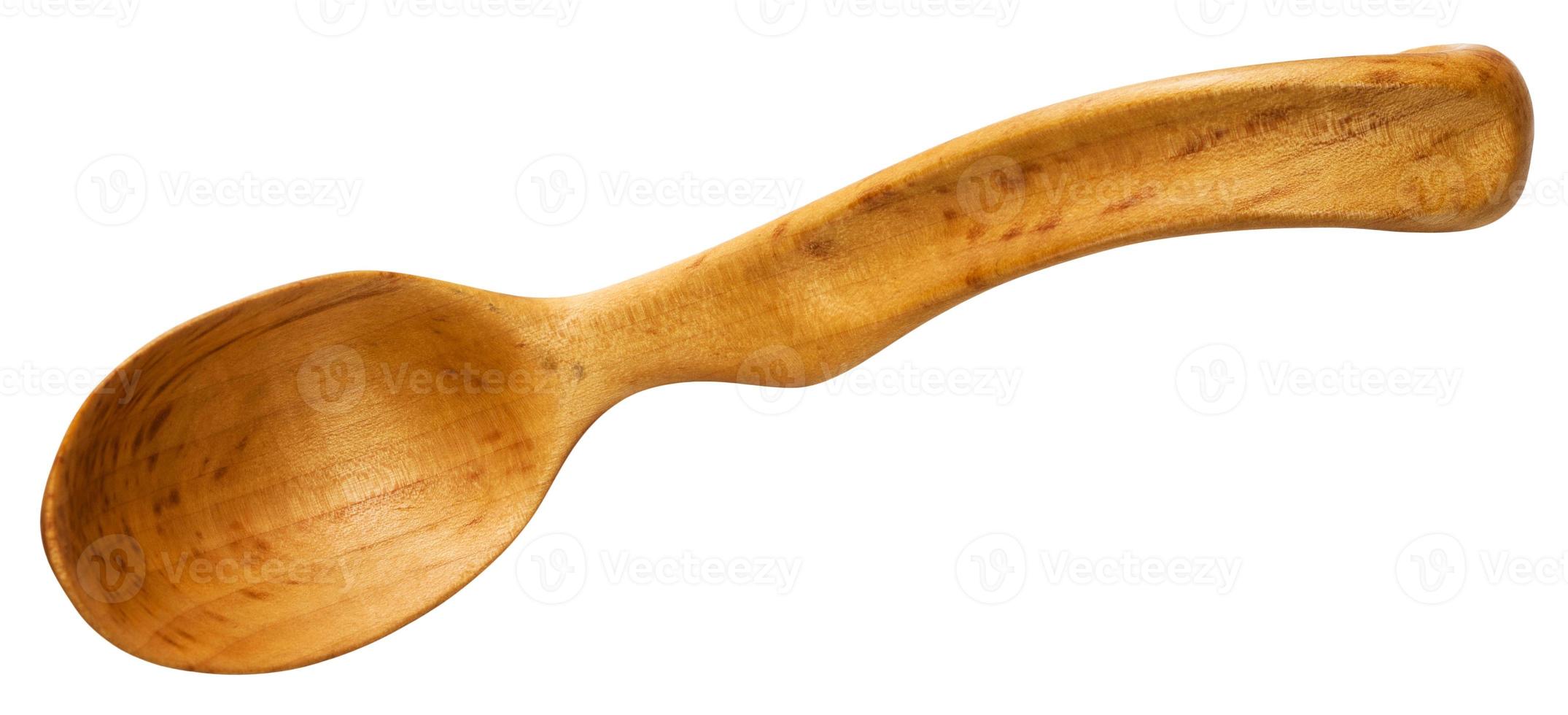 top view of wooden spoon carved from hawthorn wood photo