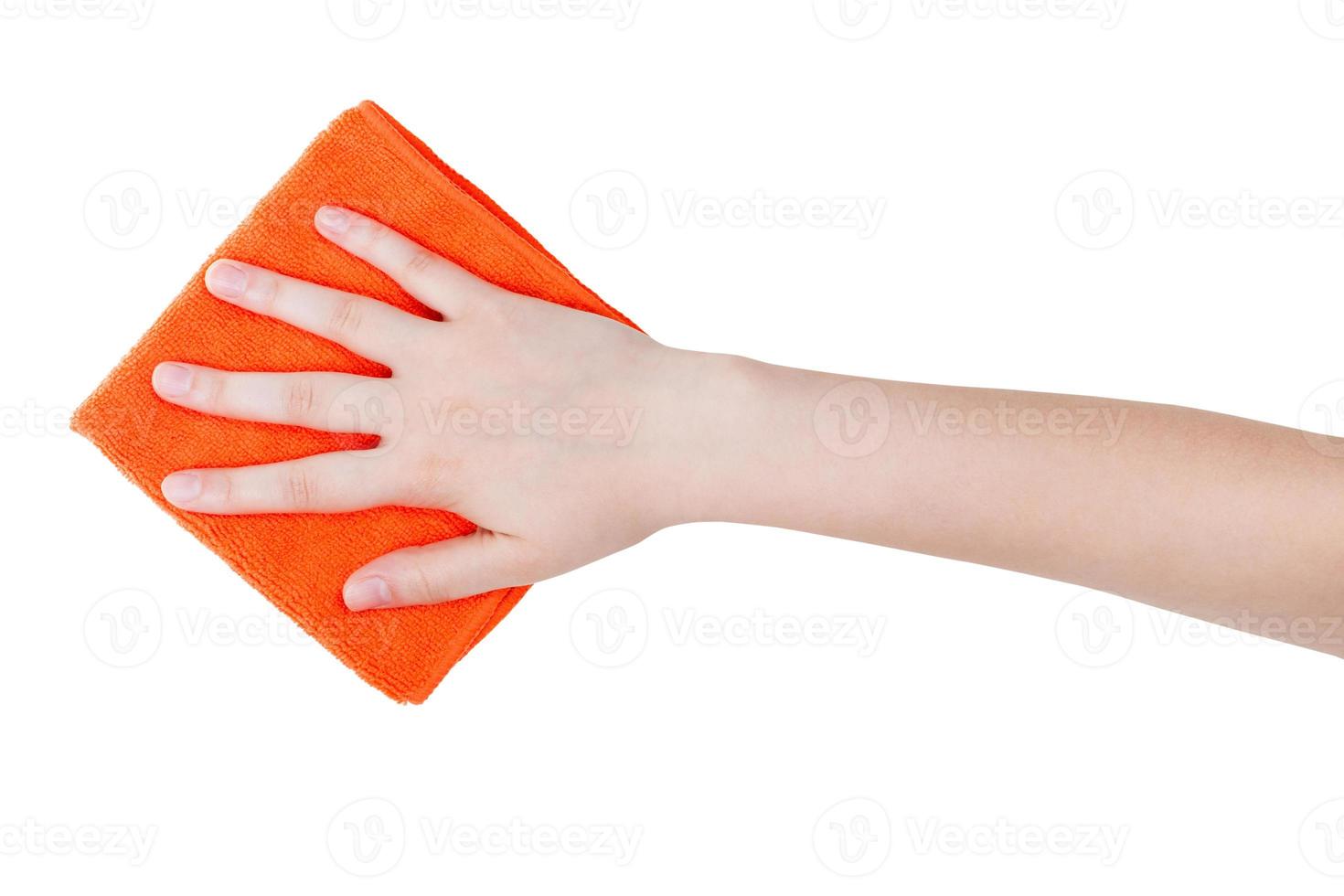 top view of hand with orange wiping rag isolated photo