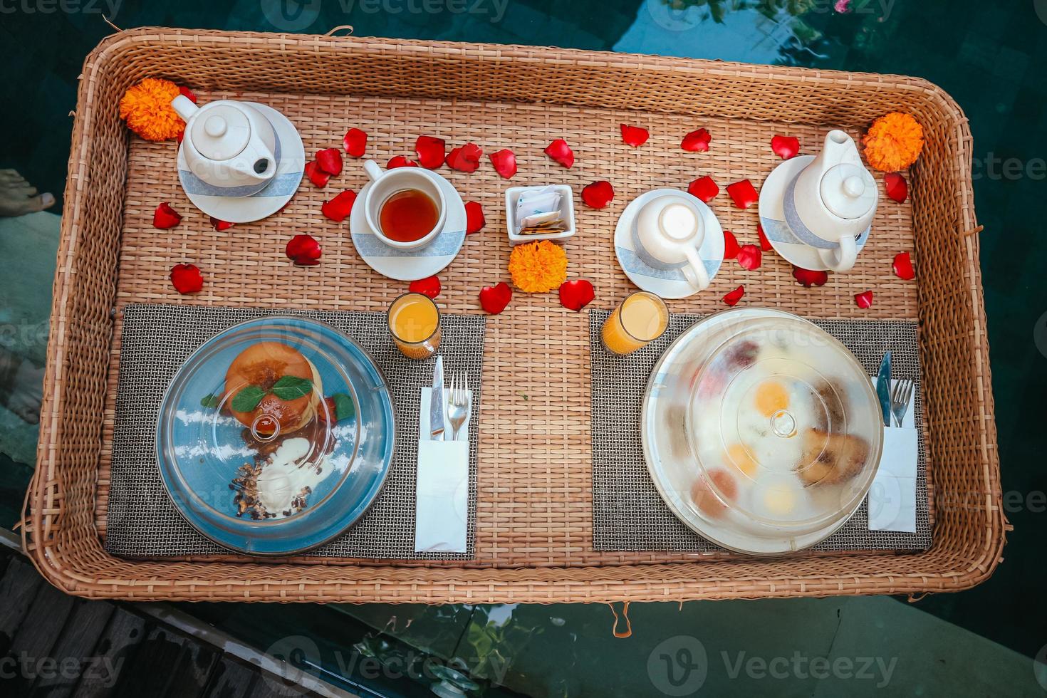 Romantic Floating Breakfast on private pool at Villa in Bali. photo