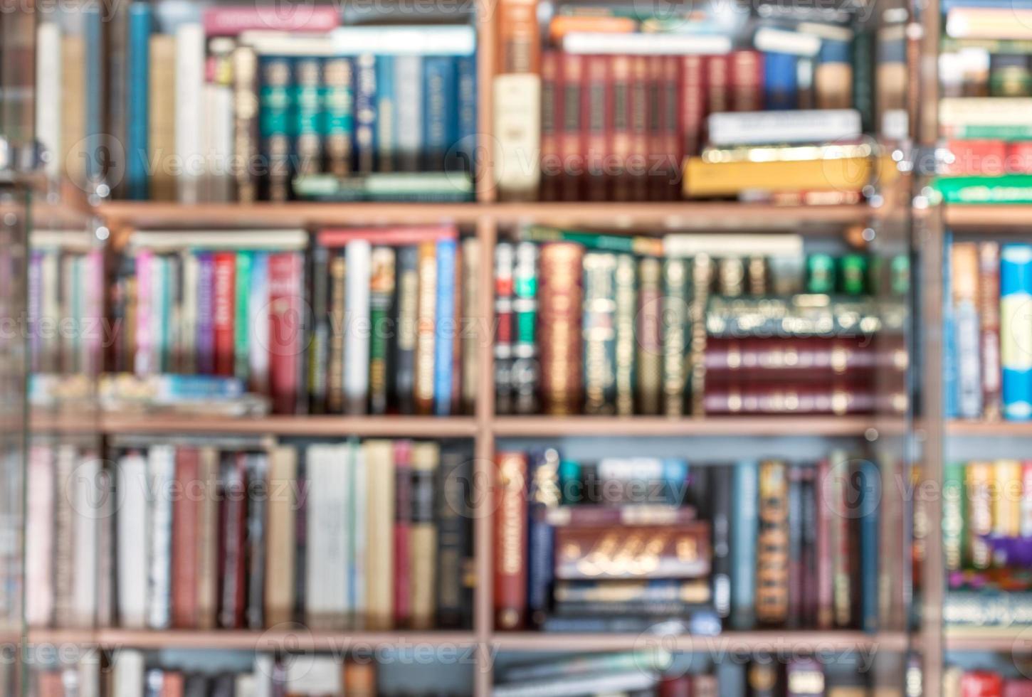 blurred background from books at bookracks photo