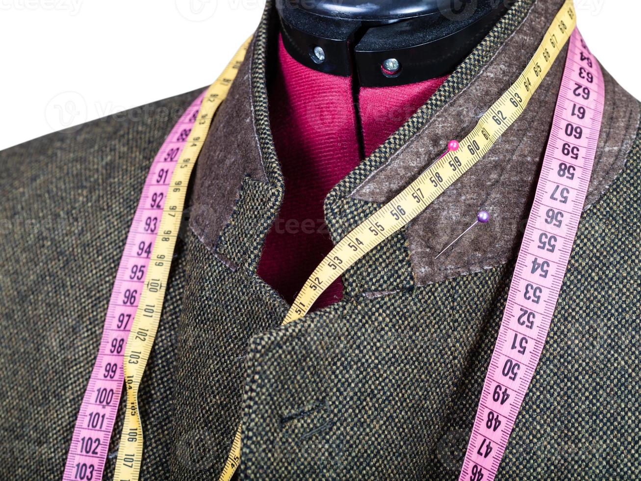 tailoring of collar for tweed jacket on mannequin photo