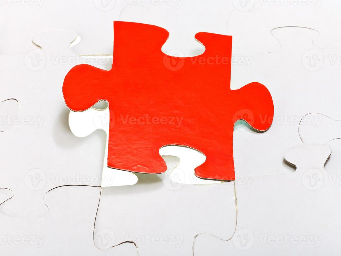 red piece attached in assembled puzzles photo