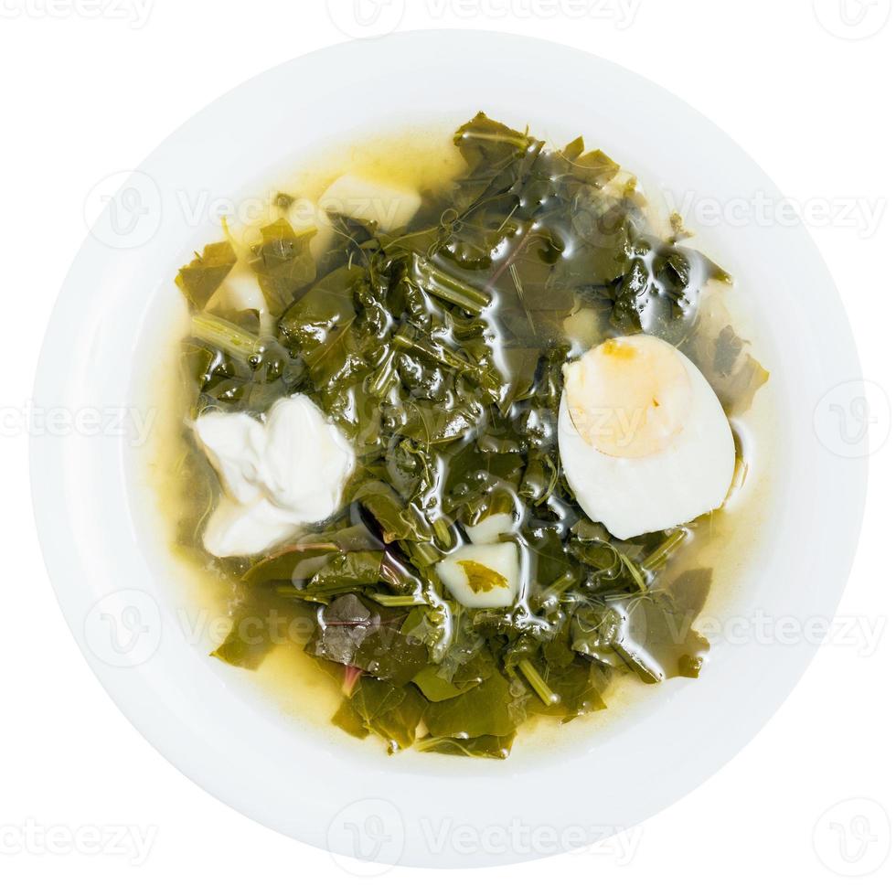 top view of vegetarian soup in plate from greens photo