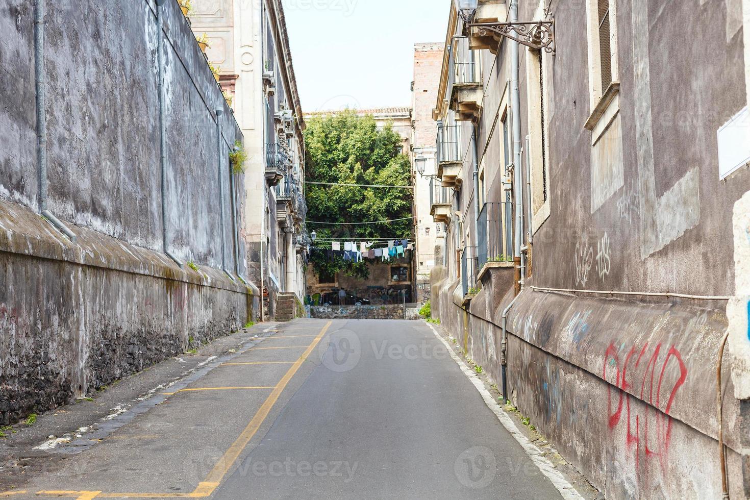 stone street in Catania city, Sicily photo
