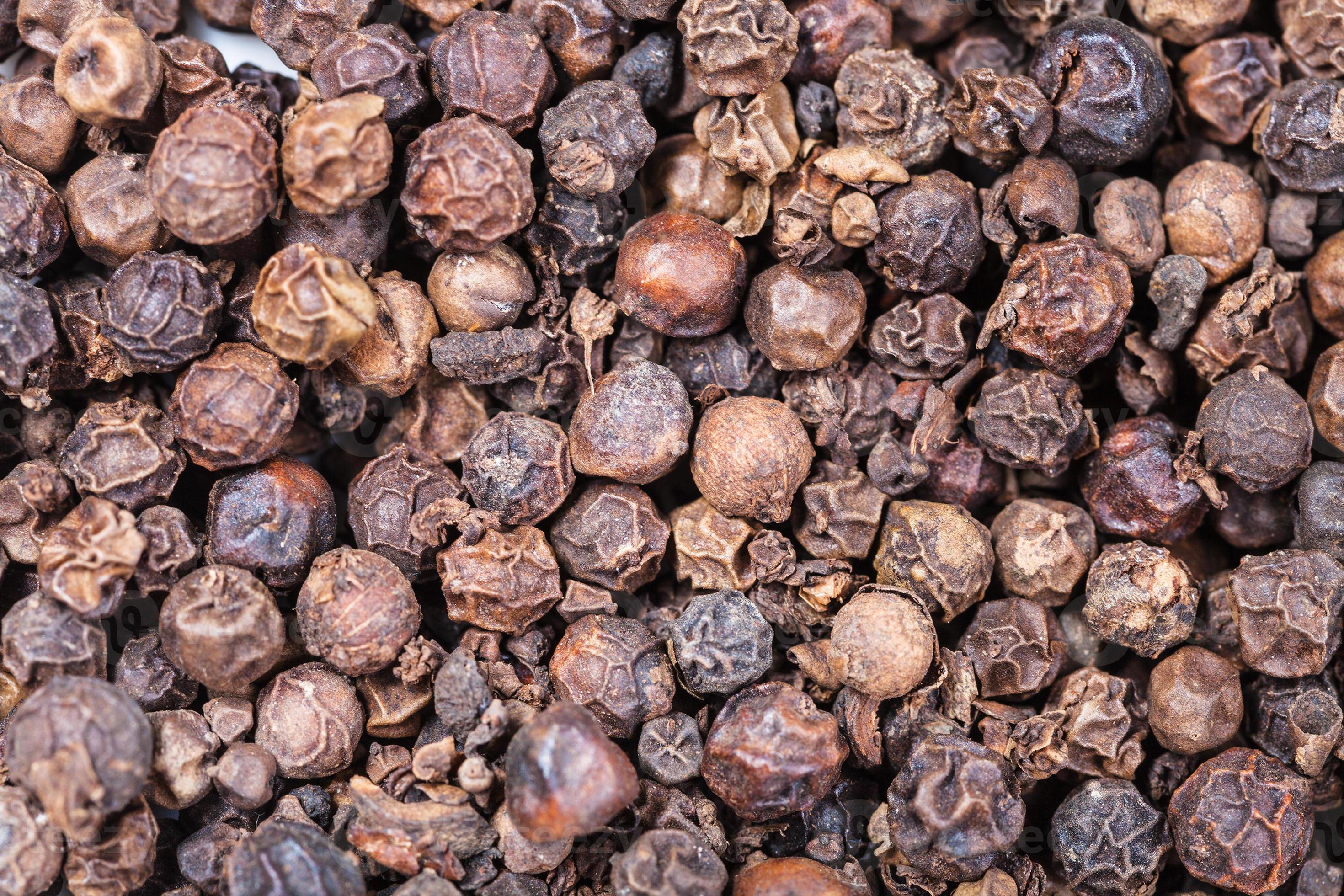 many dried Black pepper peppercorns 12252153 Stock Photo at Vecteezy