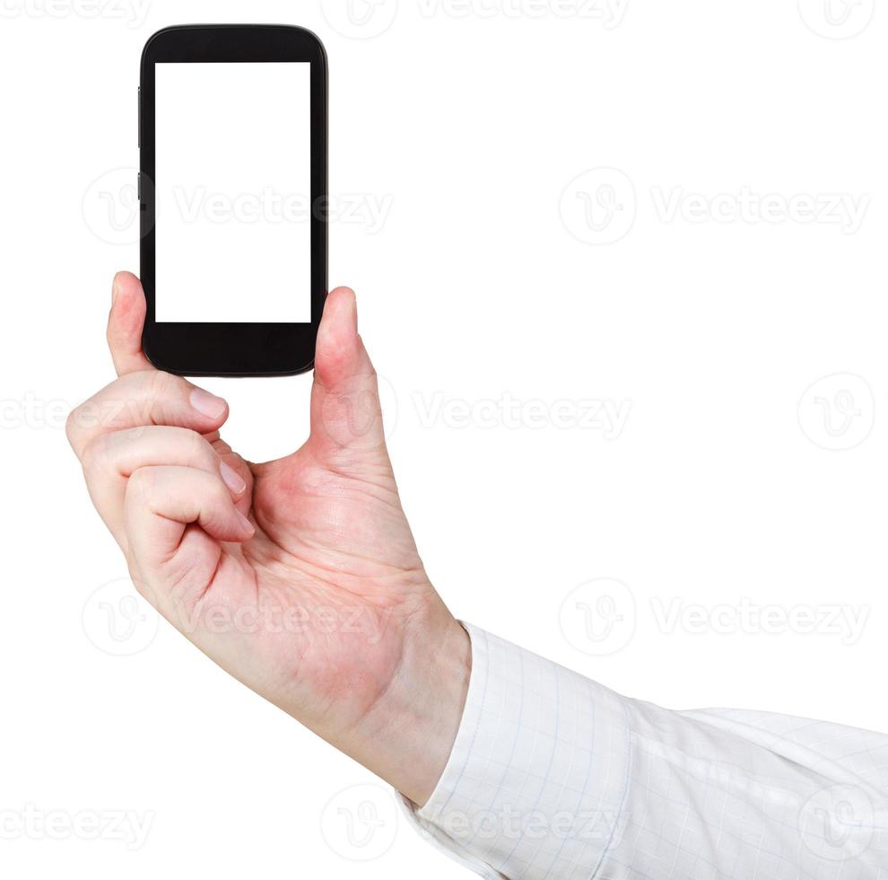 businessman holds touchscreen phone photo