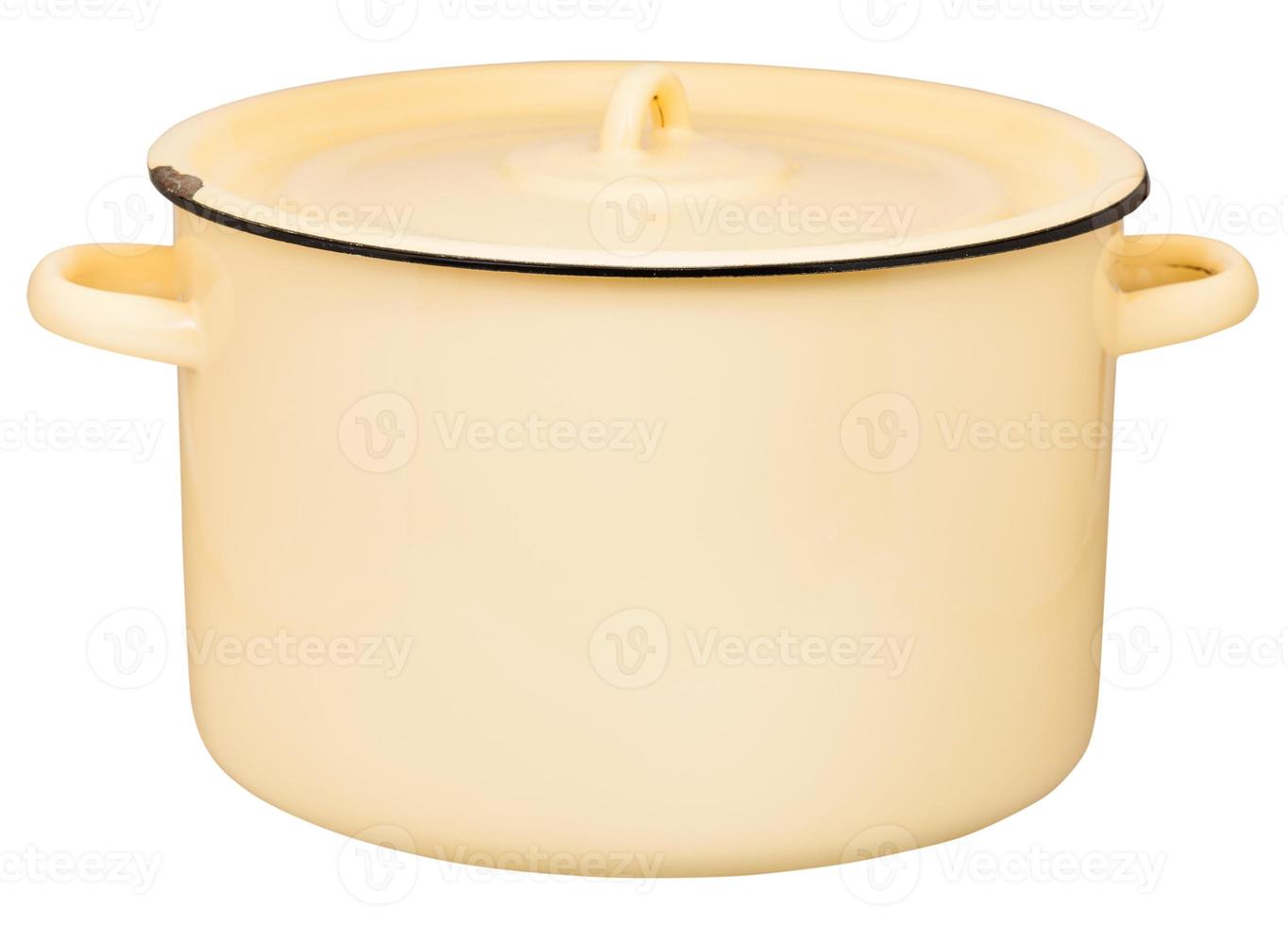 side view of large enamel stockpot closed by lid photo