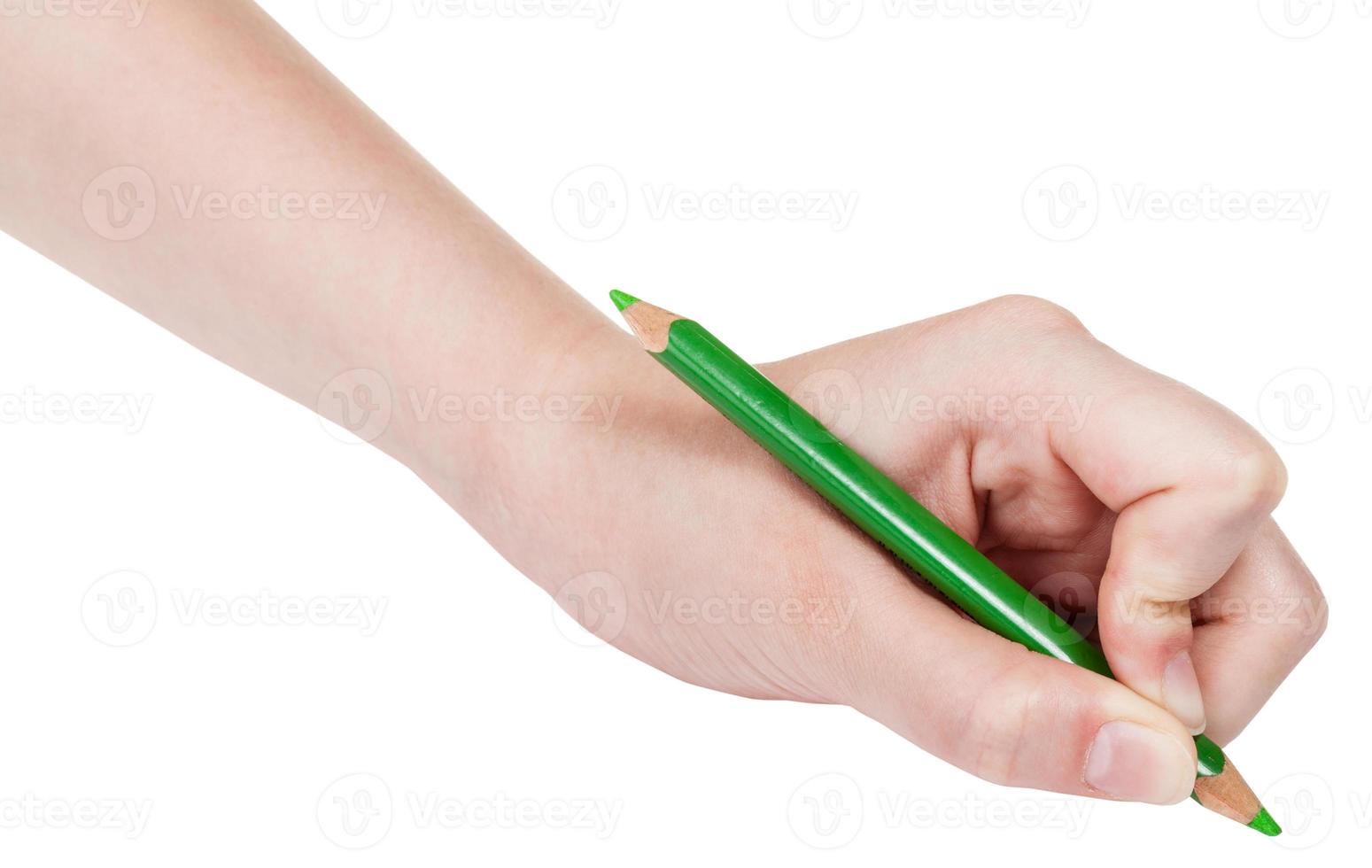 hand drafts by green pencil isolated on white photo