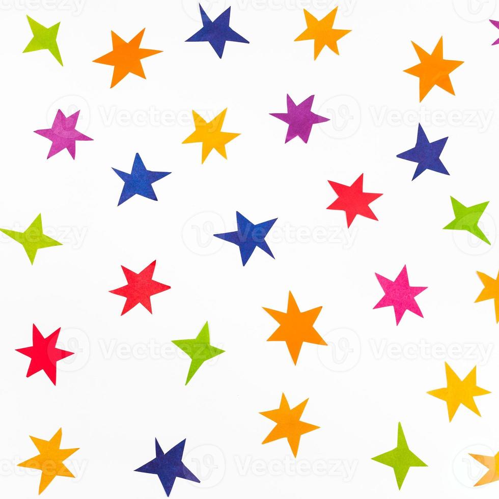 top view of various stars carved from color paper photo