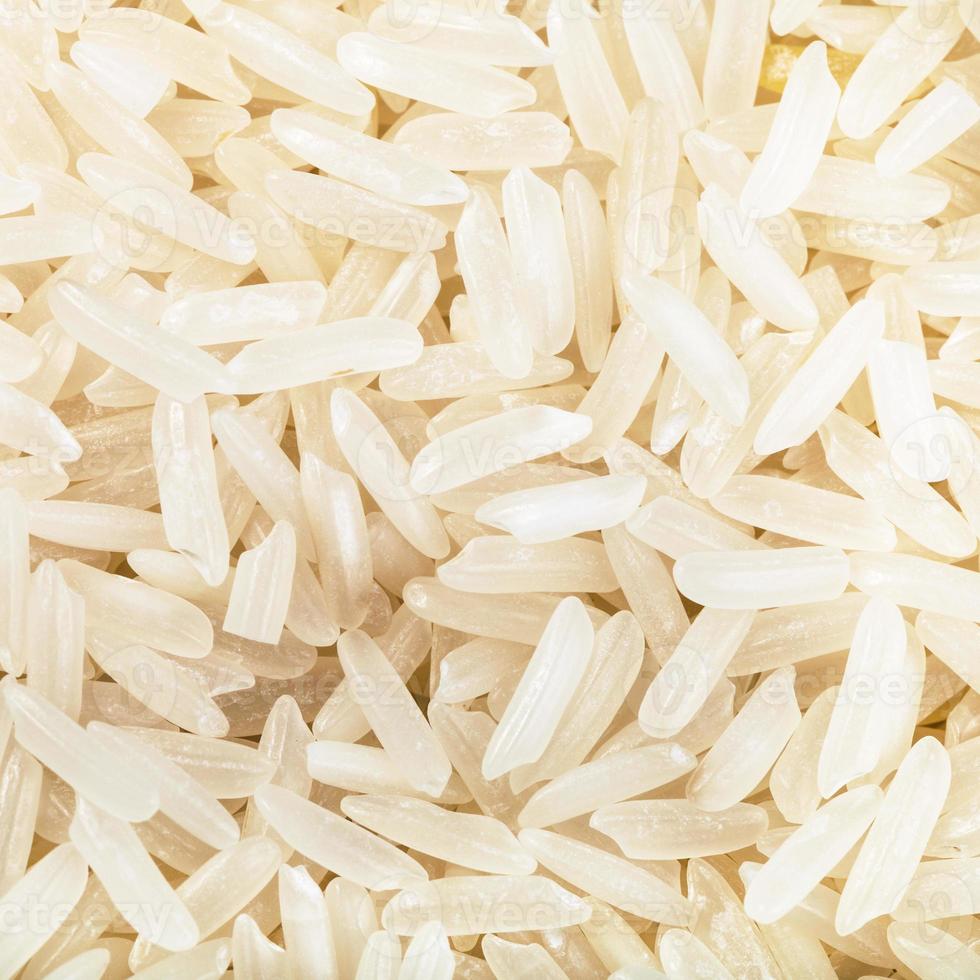 longgrain uncooked white jasmine rice 12256479 Stock Photo at Vecteezy