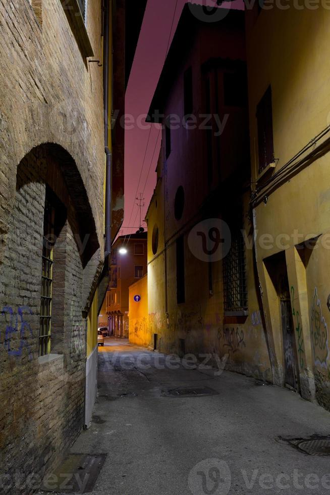 medieval street in Bologna at night photo