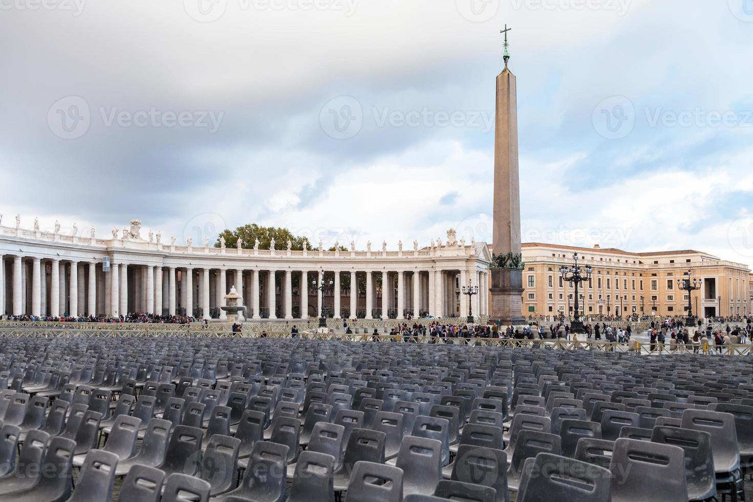 Saint Peter's Square with chairs and obelisk photo