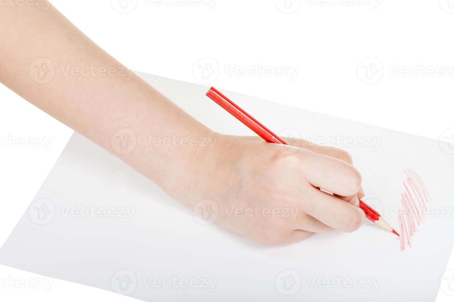 hand draws by red pencil on sheet of paper photo