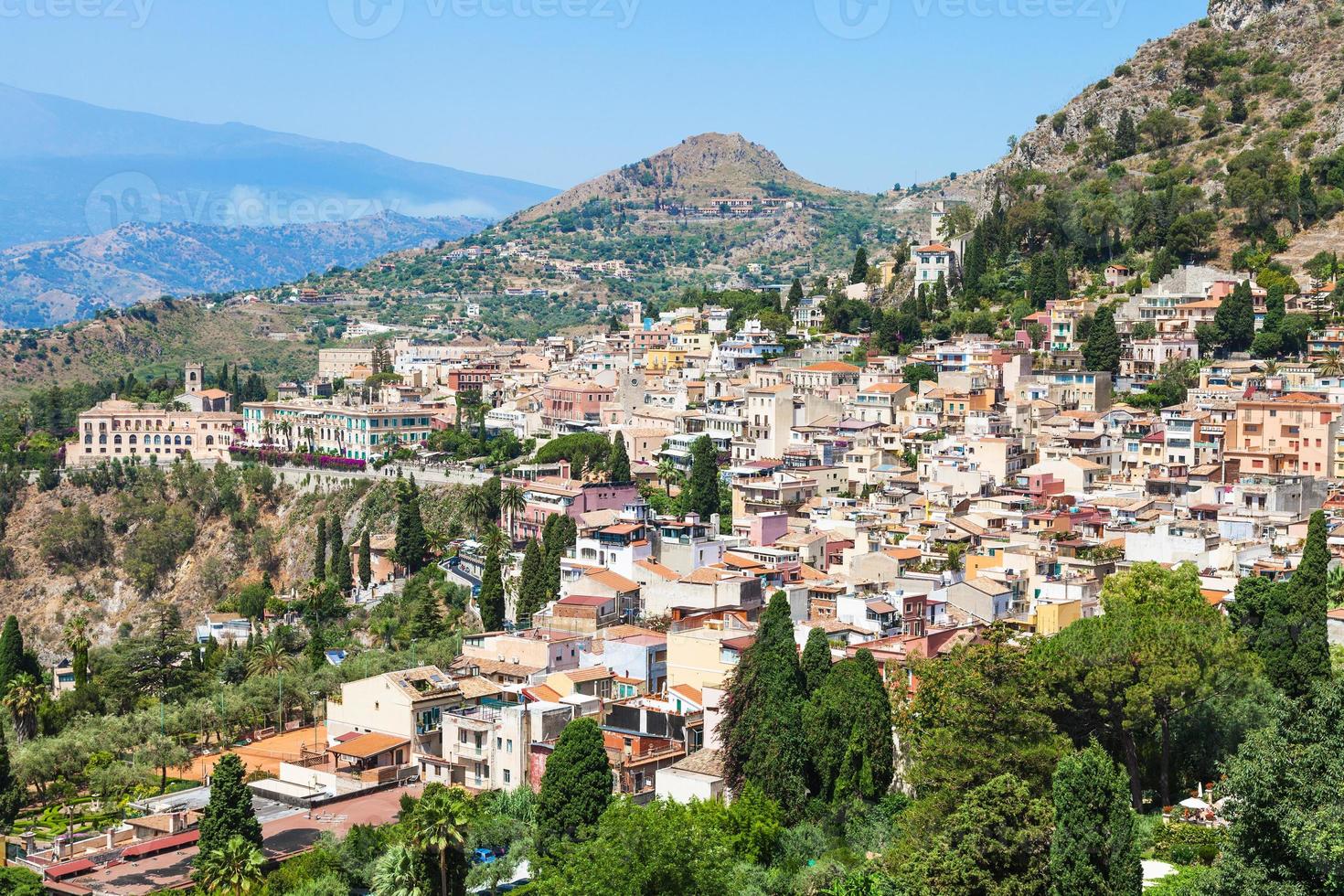 skyline of Taormina city in summer day photo