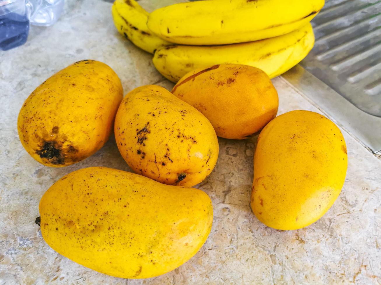 Mangos bananas tomatoes fruits and vegetables on the table Mexico