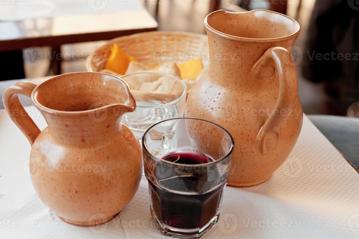 clay jugs with local red wine photo