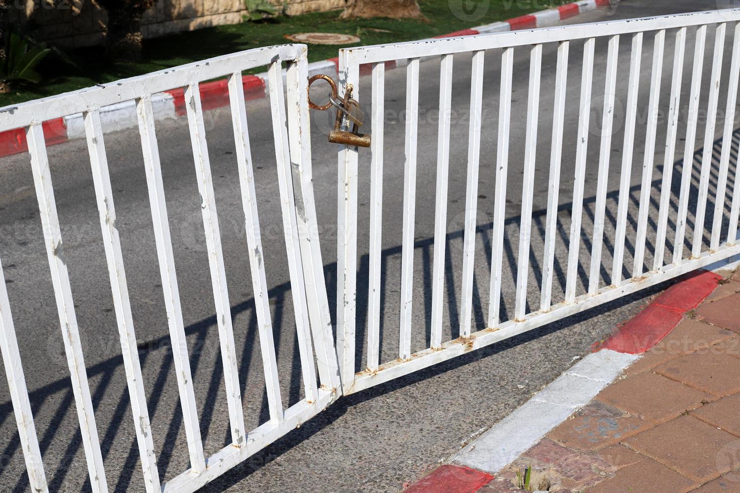 Fence in the city park on the shores of the Mediterranean Sea. photo