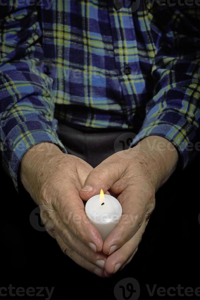 Hands and candle photo