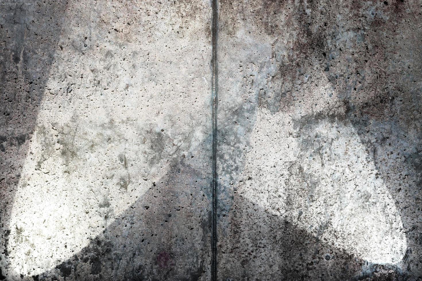 Close up view on concrete wall textures with three spotlights photo