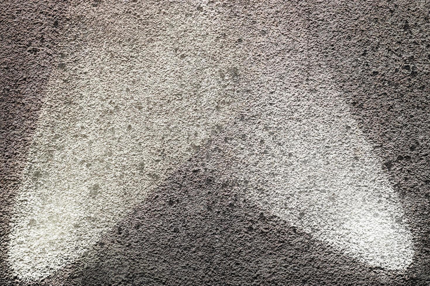 Close up view on concrete wall textures with three spotlights photo