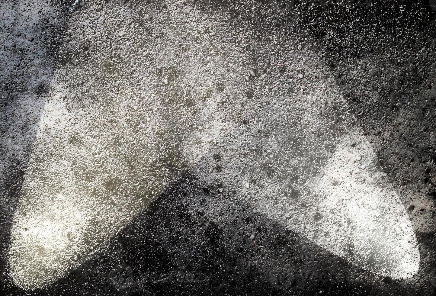 Close up view on concrete wall textures with three spotlights photo