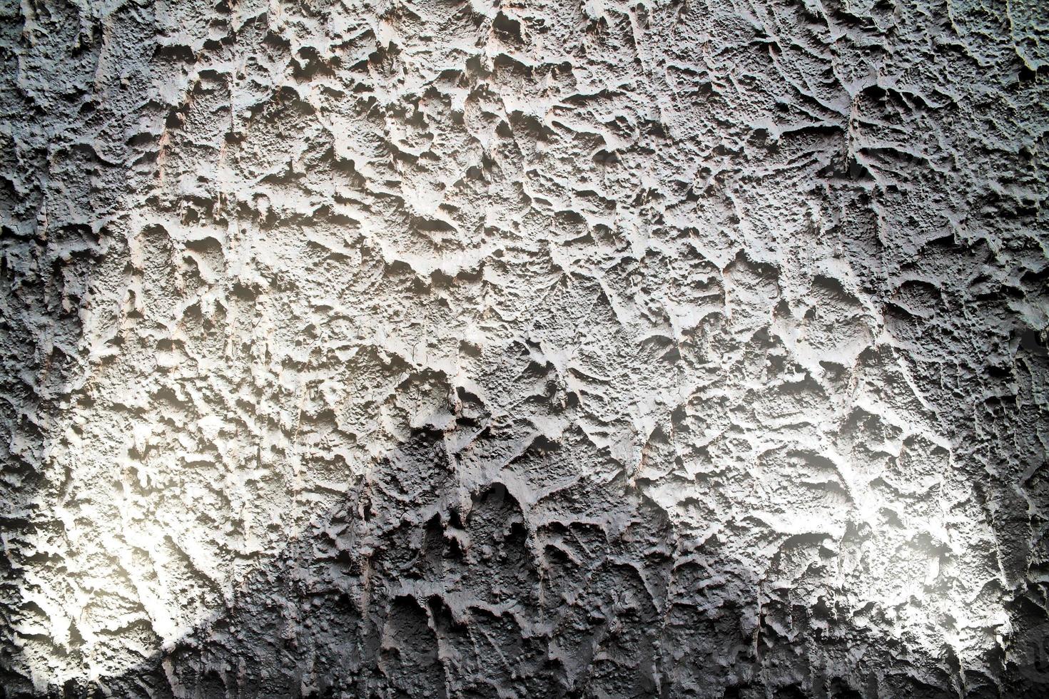 Close up view on concrete wall textures with three spotlights photo