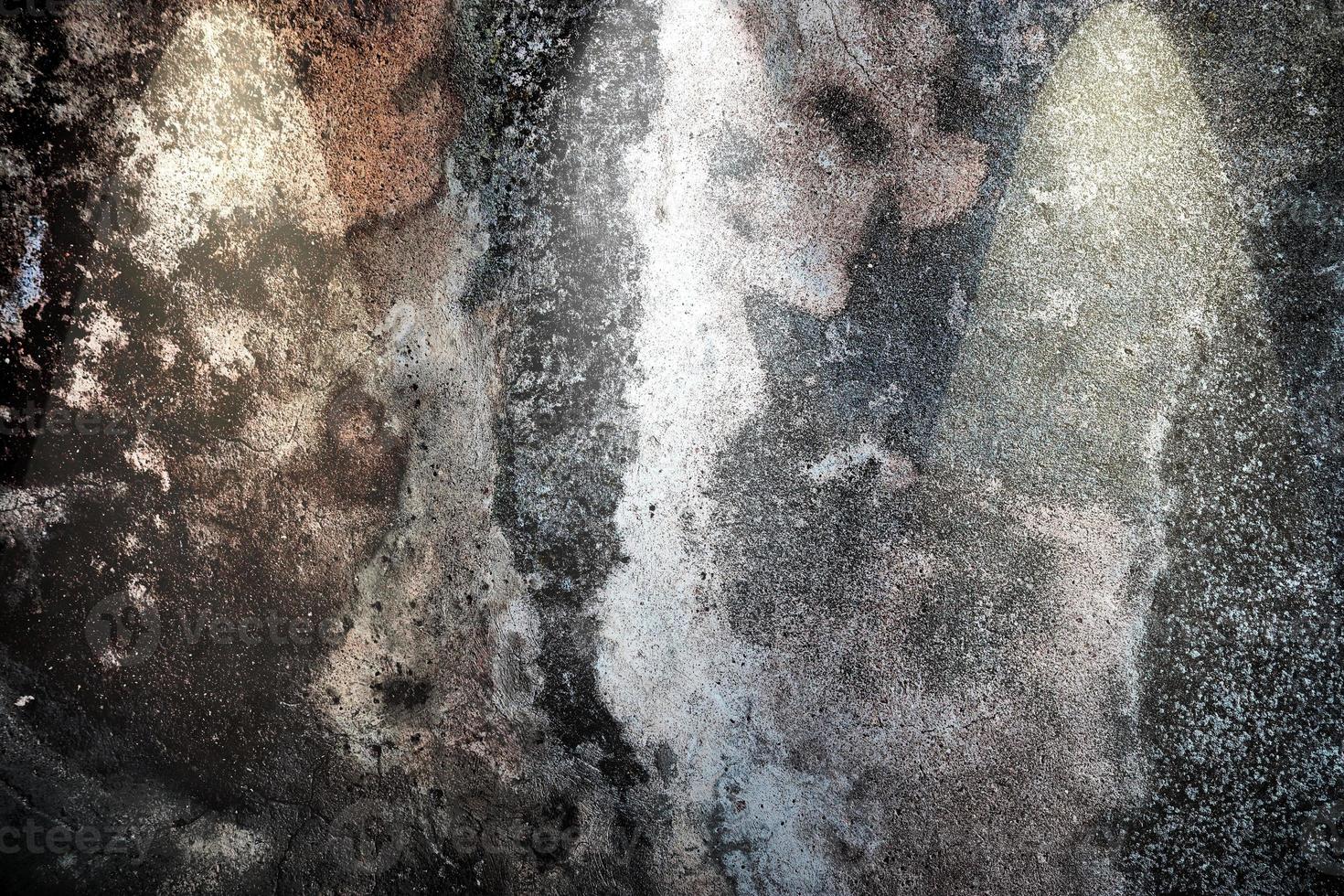 Close up view on concrete wall textures with three spotlights photo