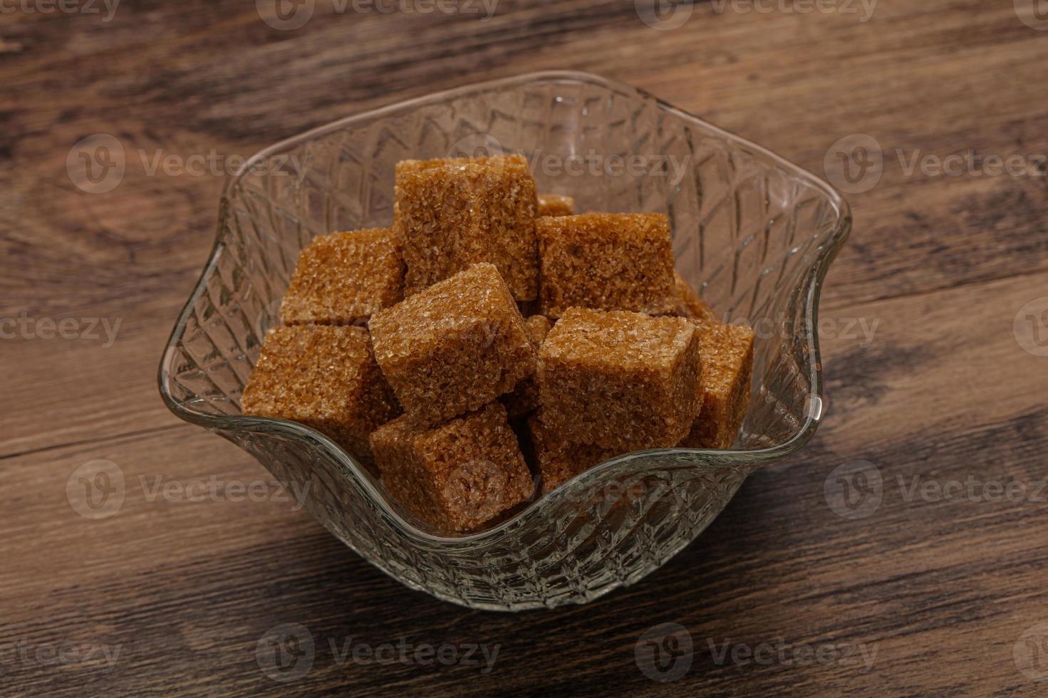 Cane sugar cubs in the bowl photo