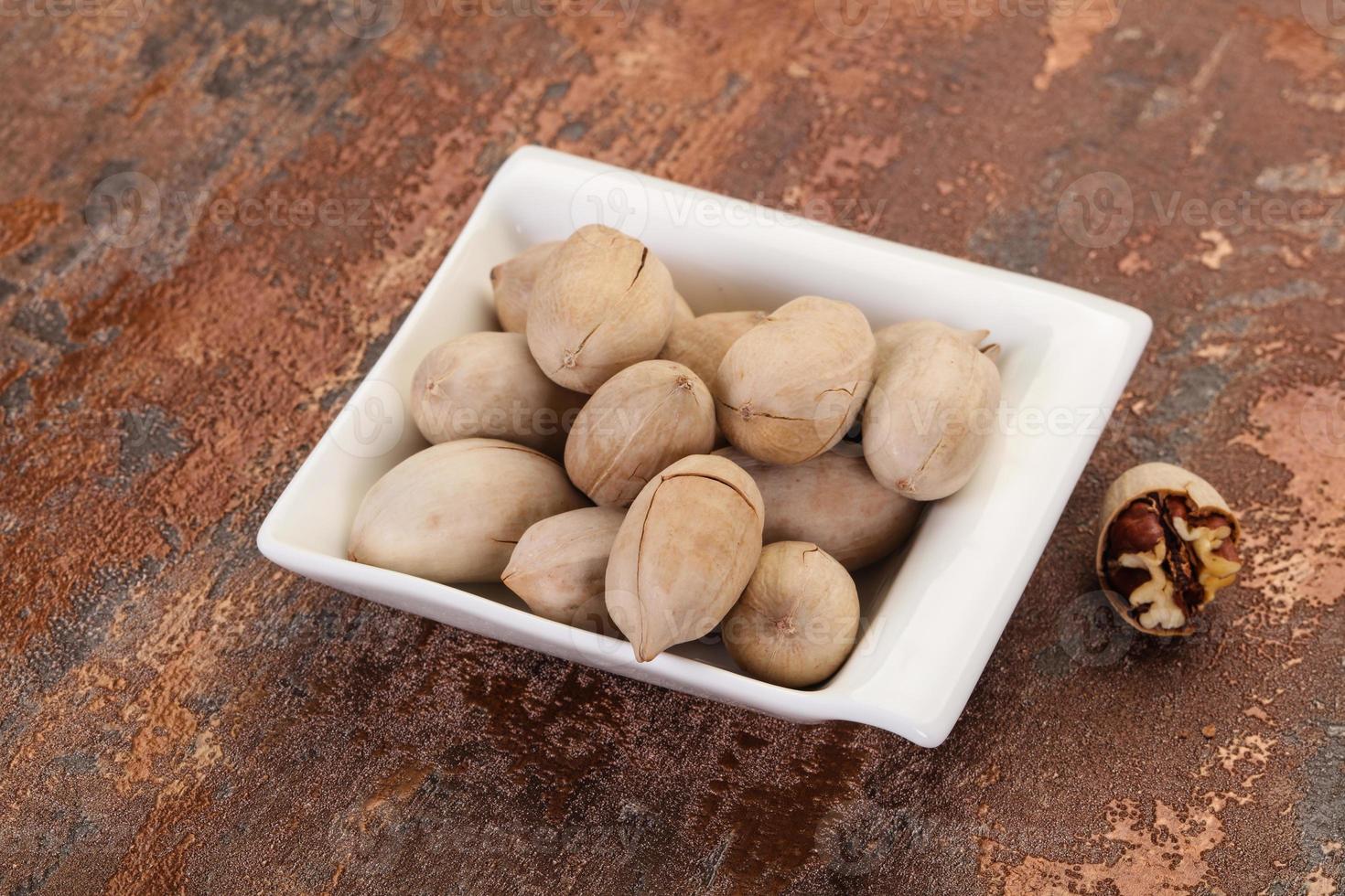 Pecan nuts heap photo