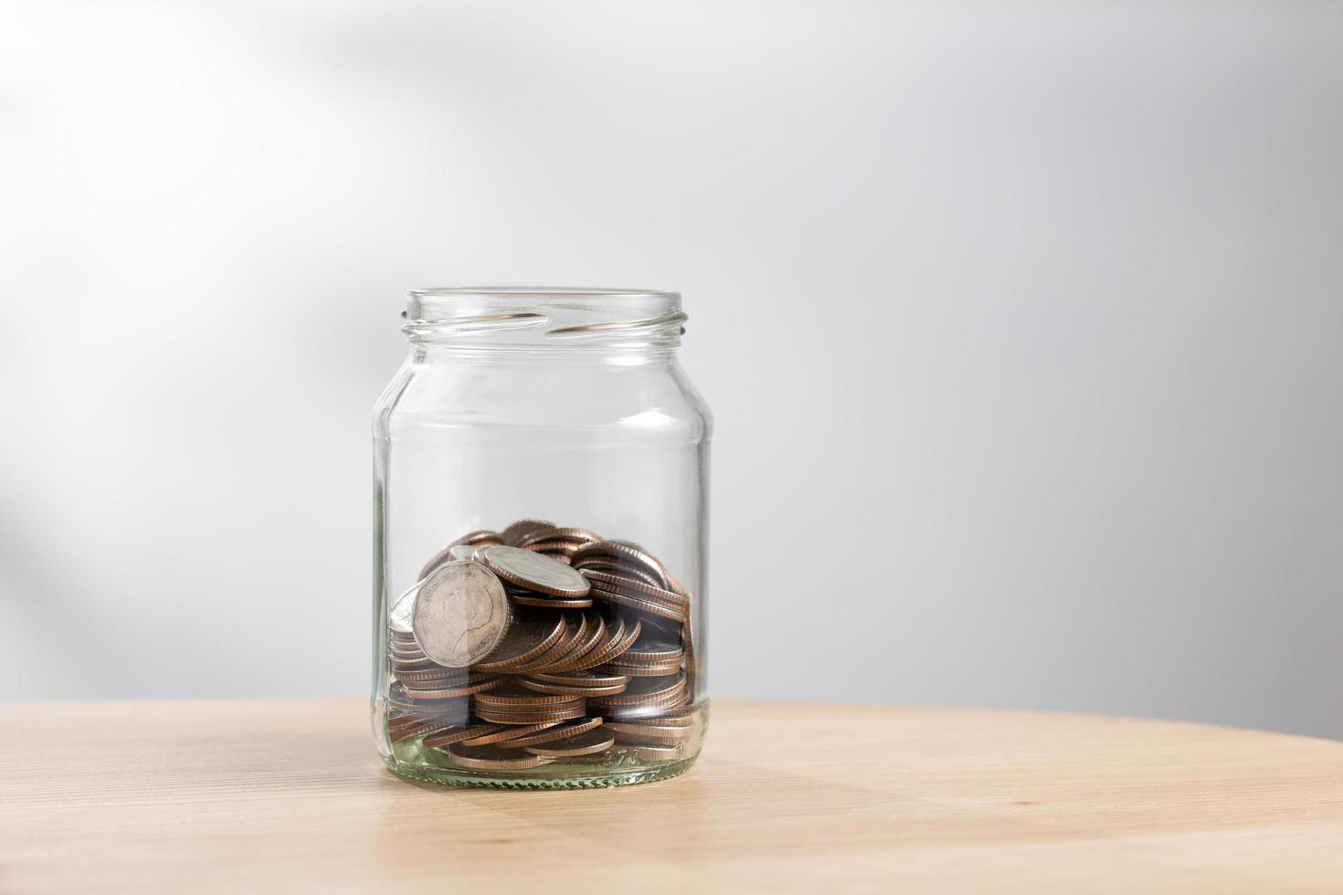 Coin in a glass bottle, Loss money photo