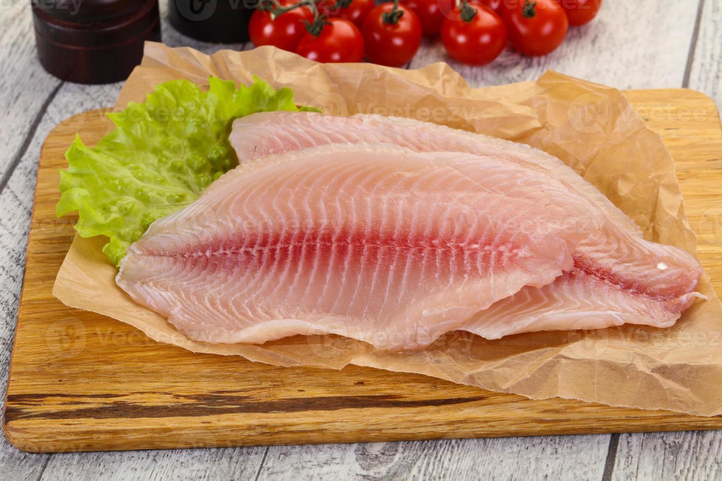 Raw tilapia fish 12268167 Stock Photo at Vecteezy