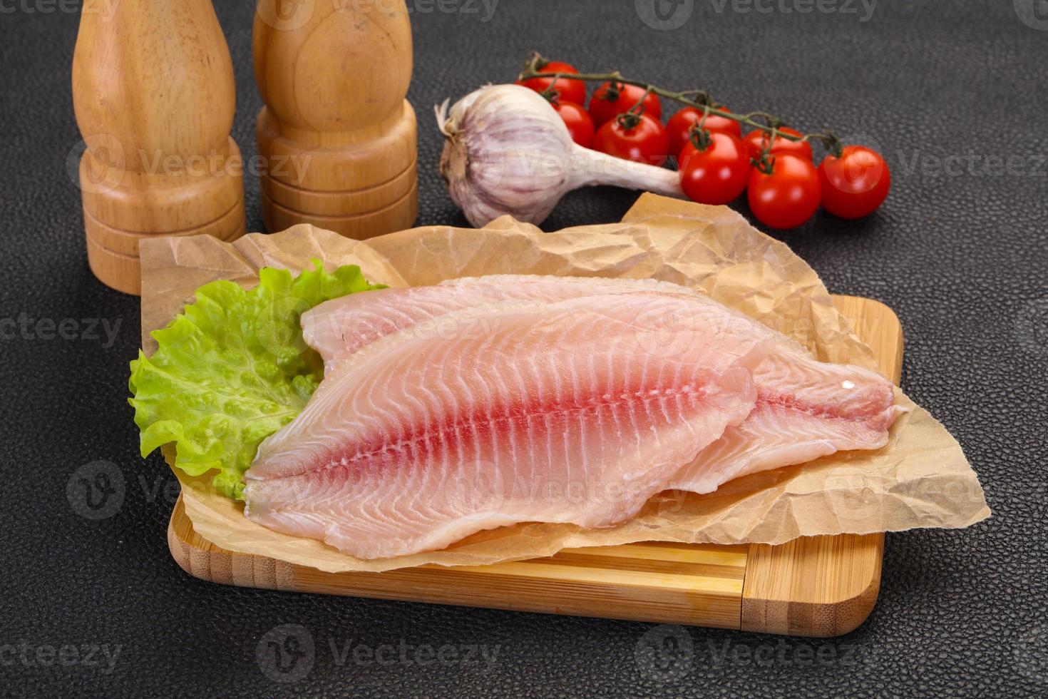 Raw tilapia fish 12269294 Stock Photo at Vecteezy