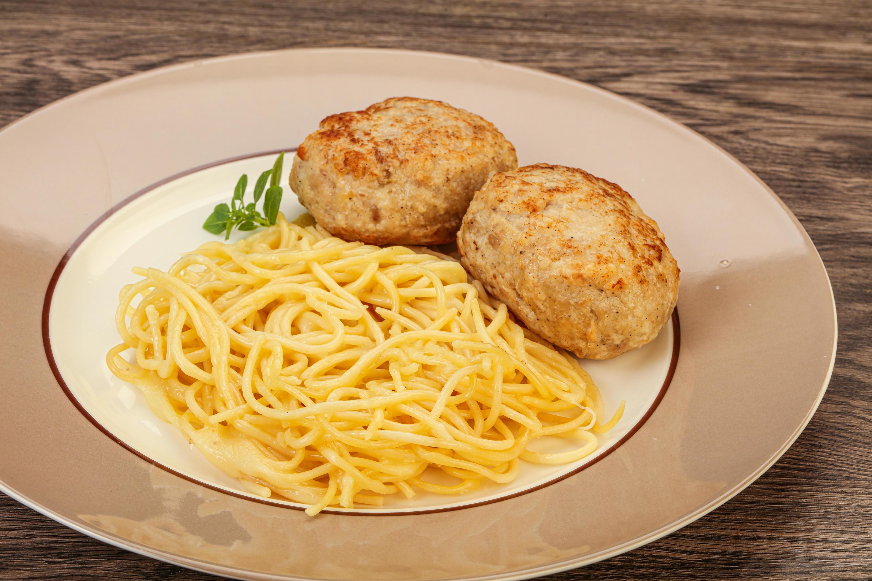 Spaghetti with homemade chicken cutlet 12271294 Stock Photo at Vecteezy