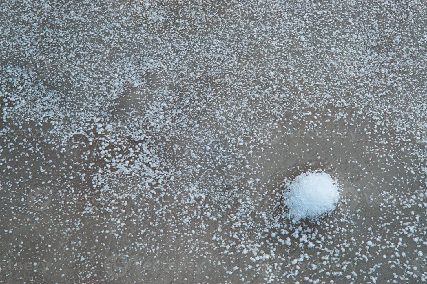 Snowflakes on the rock photo
