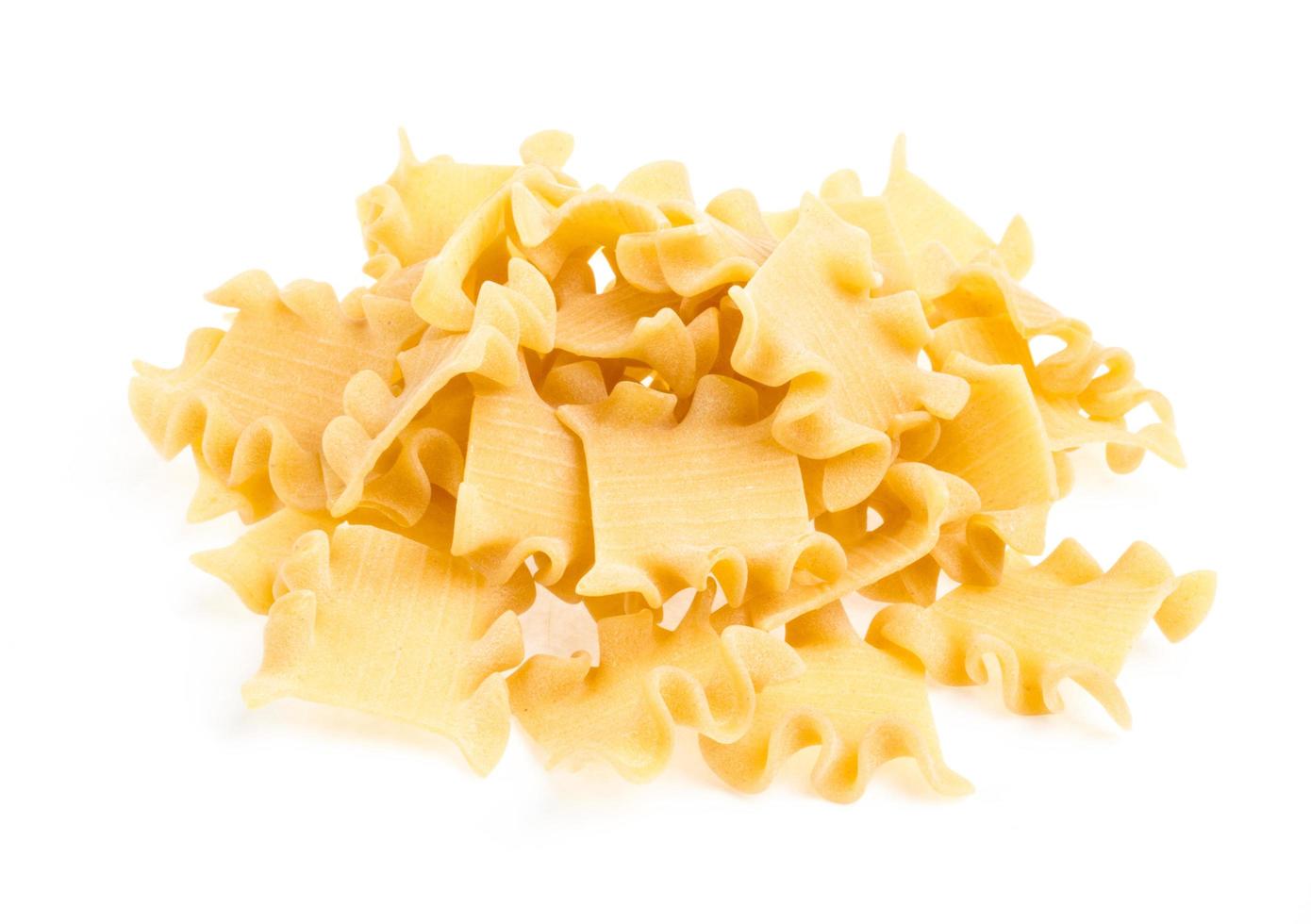 Raw yellow Italian pasta photo