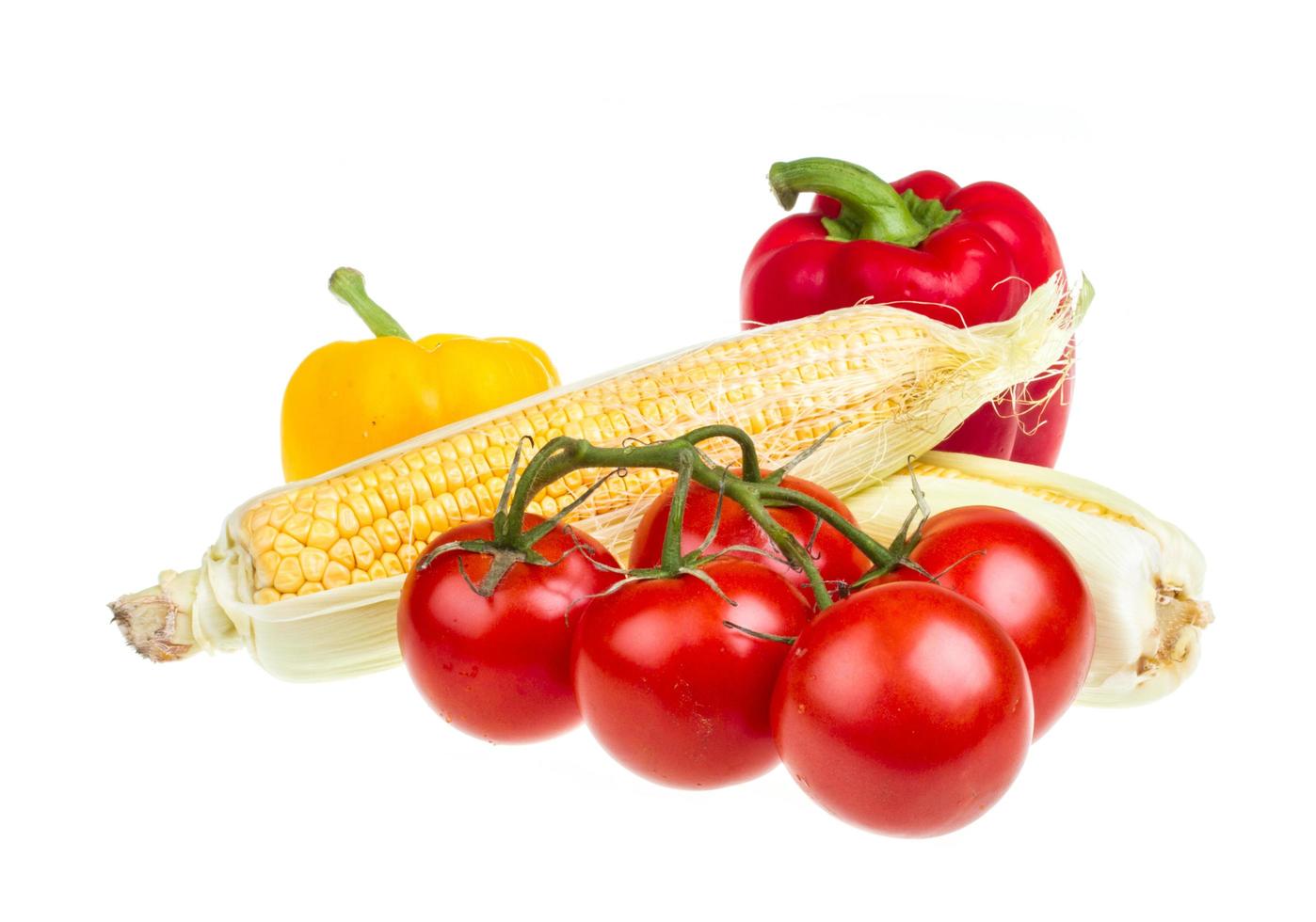 pepper, ripe yellow corn and tomato photo